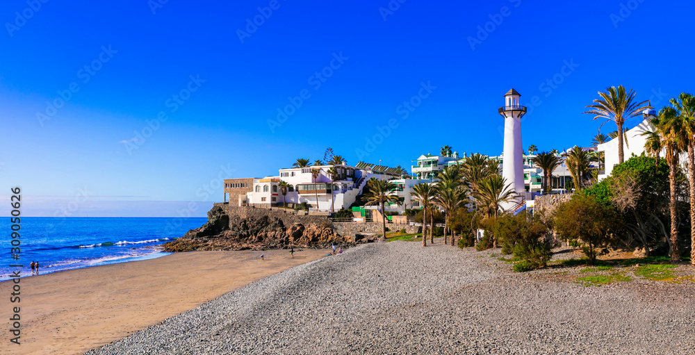 Beautiful beach with lighthouse Playa del Aguila, Bahia Feliz, Grand Canary island