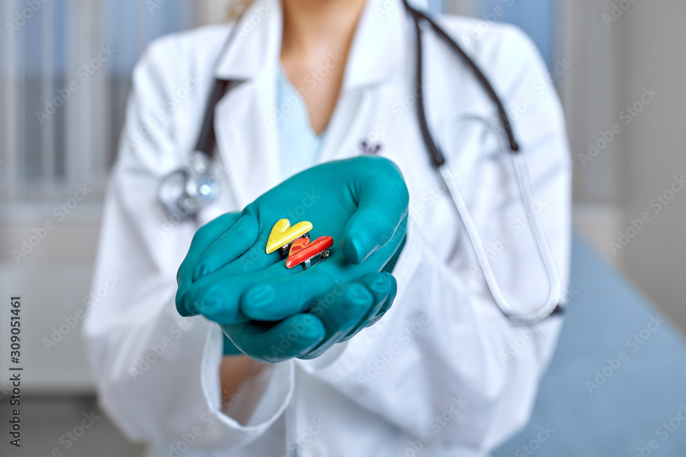 doctor holding simbols of heart in hand with medical care concept, Medicine in hospital, cardiology doctor holding simbols of heart in hand with medical care concept, Medicine in hospital, cardiology