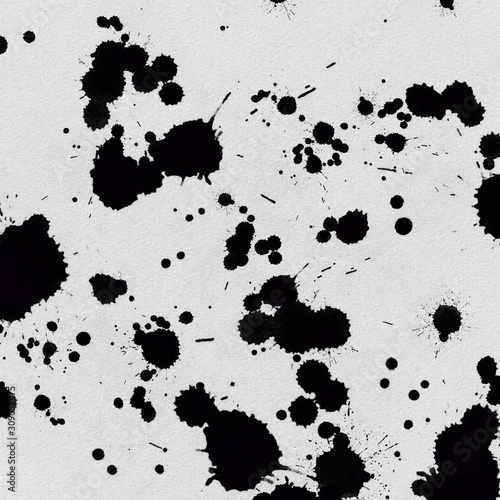 Black paint splattered on White textured background
