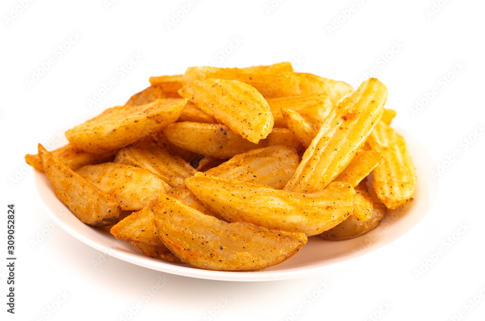 Pile of Spiced Potato Wedges Isolated on a White Background Pile of Spiced Potato Wedges Isolated on a White Background