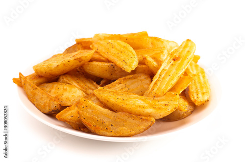 Pile of Spiced Potato Wedges Isolated on a White Background