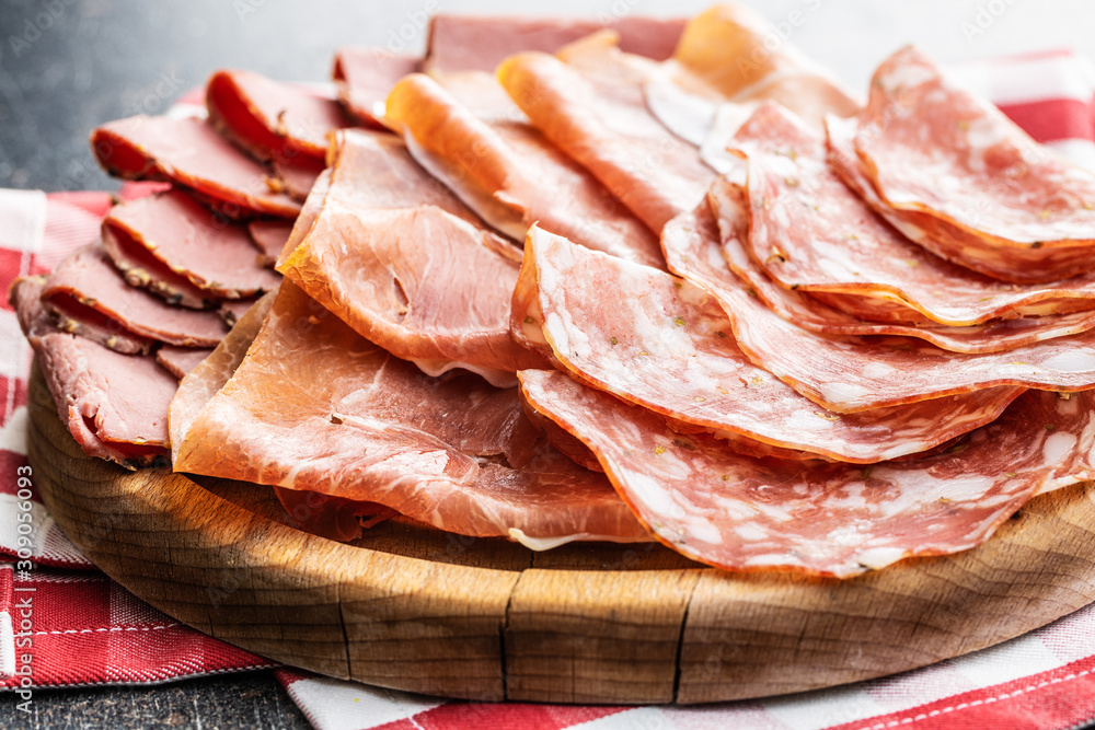 Sliced salami, prosciutto and roast beef. Sliced salami, prosciutto and roast beef.