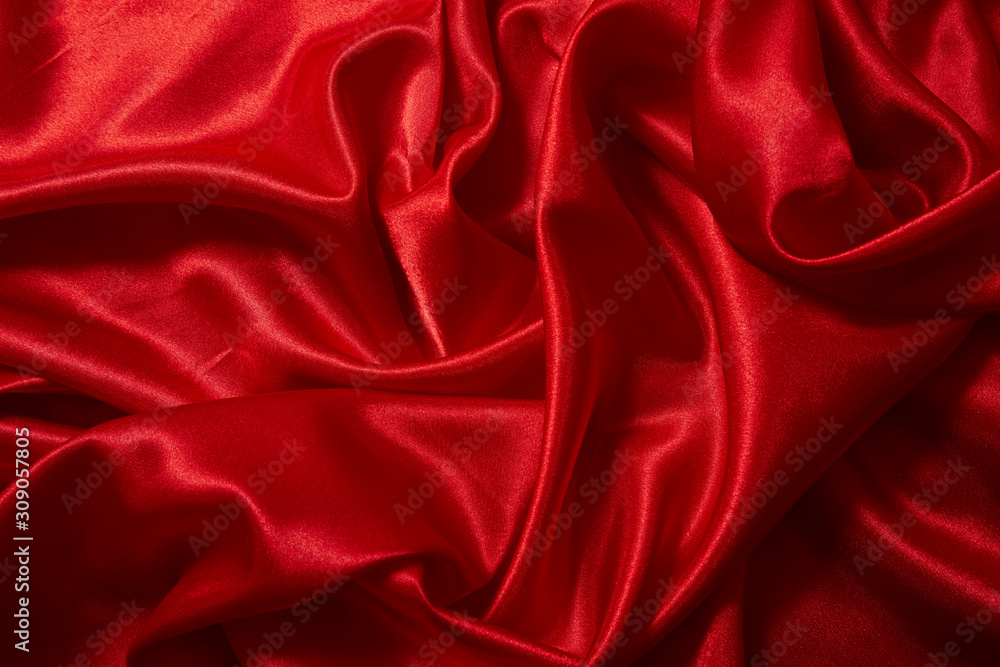 Luxury red satin smooth fabric background for celebration, ceremony, event invitation card or advertising poster Luxury red satin smooth fabric background for celebration, ceremony, event invitation card or advertising poster