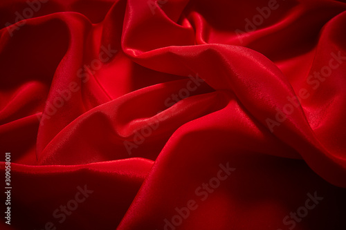 Luxury red satin smooth fabric background for celebration, ceremony, event invitation card or advertising poster