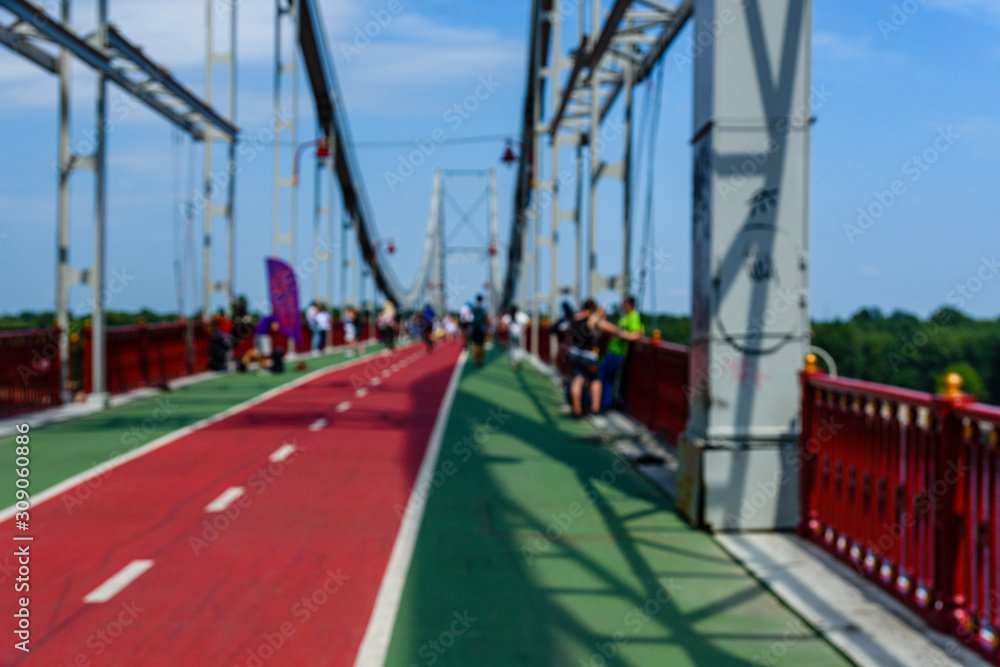 Defocused blurred background of the people on bridge Defocused blurred background of the people on bridge