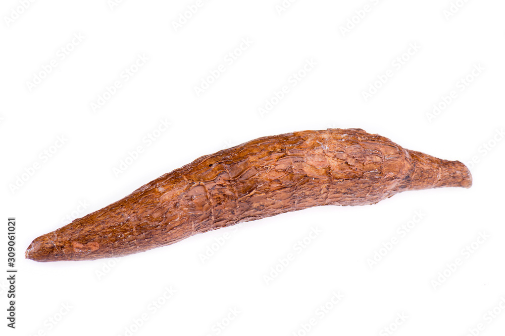 Uncooked manioc isolated on a white background Uncooked manioc isolated on a white background