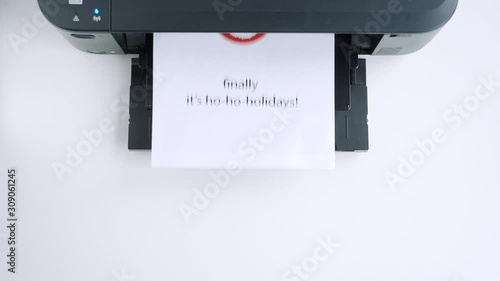 Printing NEW YEAR card in the office. Christmas greeting for a colleague 