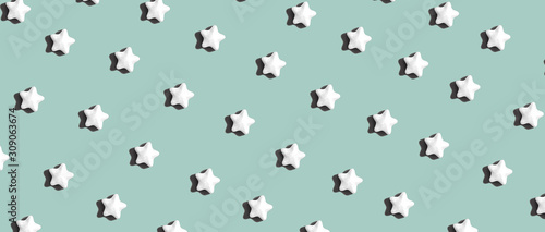 Star shaped small sugar candies - flat lay © Tierney