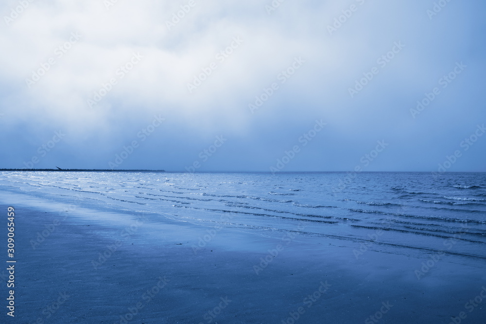 Navy classic blue sea water texture. Classic blue pool water with sun reflections. Trendy colour 2020 year. Classic blue background. Dark classic blue sea wave. Abstract monochrome texture. Color 2020 Navy classic blue sea water texture. Classic blue pool water with sun reflections. Trendy colour 2020 year. Classic blue background. Dark classic blue sea wave. Abstract monochrome texture. Color 2020