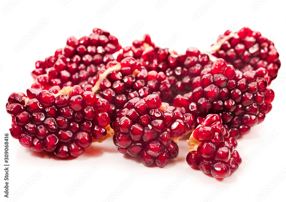 Pieces of pomegranate isolated on a white background. Pieces of pomegranate isolated on a white background.