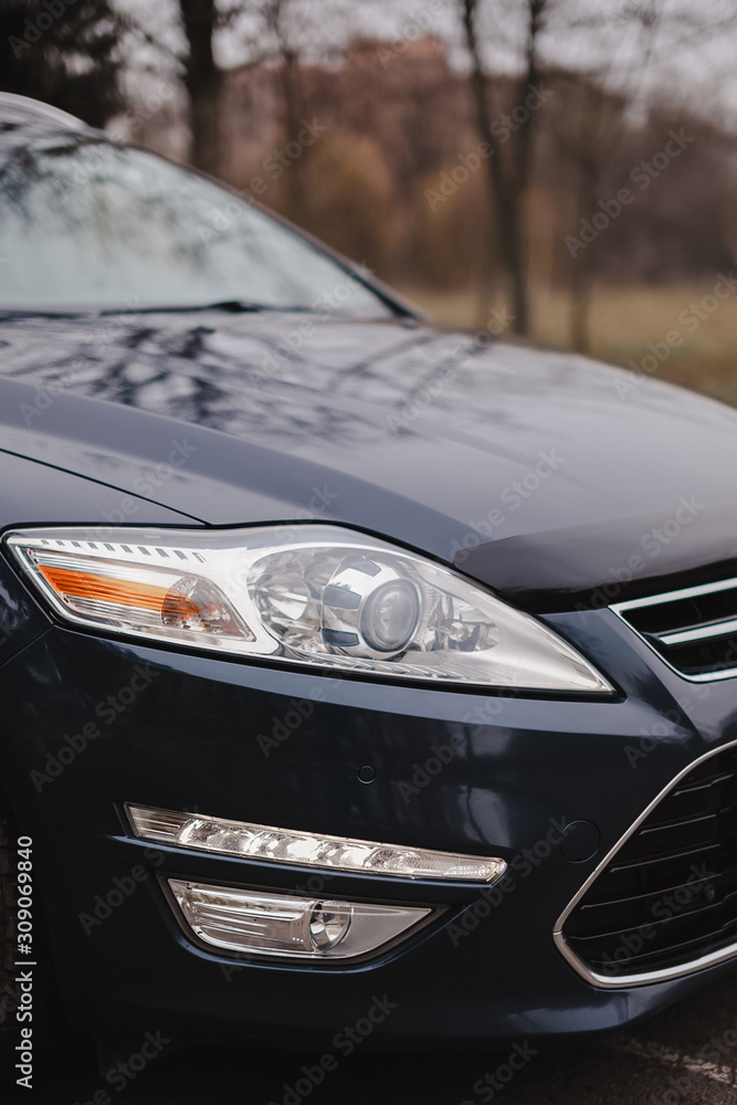 Car headlights on the street. Luxury Headlights. Car part close up. Car headlights on the street. Luxury Headlights. Car part close up.