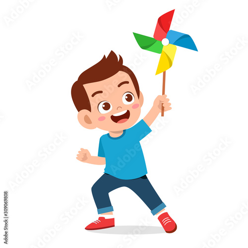 happy cute kid boy smile holding toy