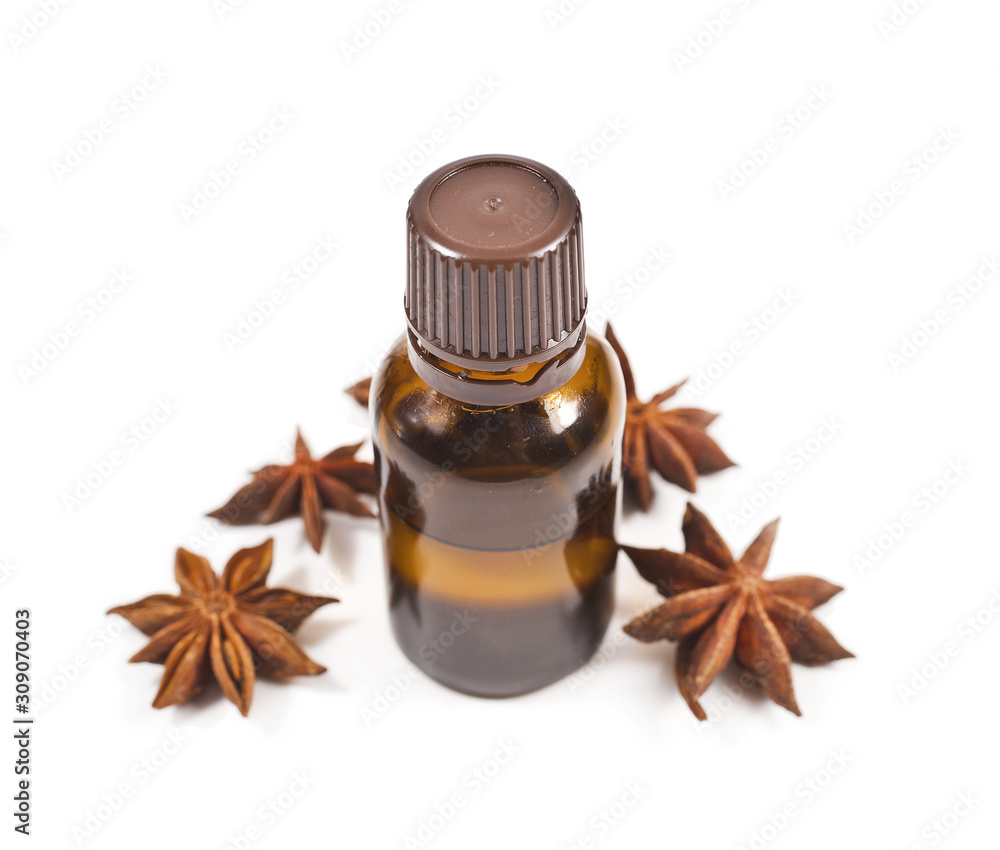 Anise oil and star anise isolated on a white background. Anise oil and star anise isolated on a white background.