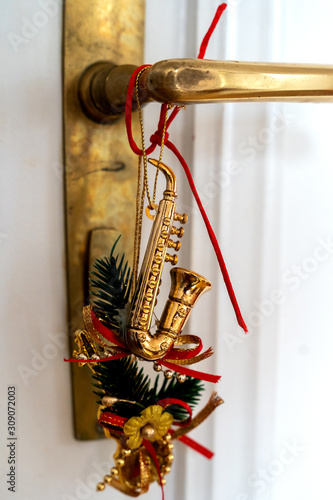 Christmas decoration red golden saxophone tree handle door
