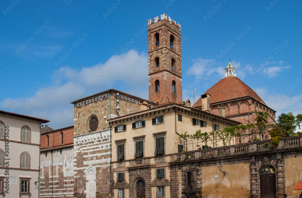 Micheletti Palace and the bell tower of Chiesa dei Santi Giovanni e Reparata, Piazza San Martino, Lucca, Italy.
