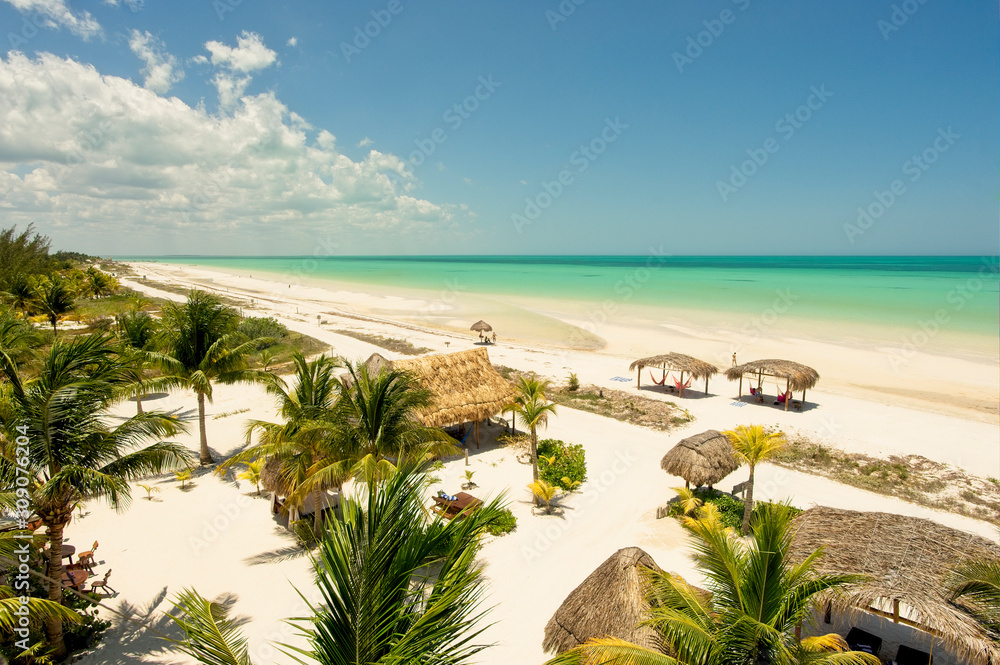 Holbox, Mexico - November 2019: Palapa on the beach Caribbean Sea view in Holbox island Mexico. Panoramic view of a Caribbean resort