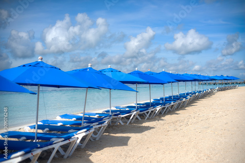A place facing the Caribbean Sea. Beautiful beach in ISLA MUJERES Mexico, near the coral reef, with palong chairs where you can relax enjoying the breeze and the sun.