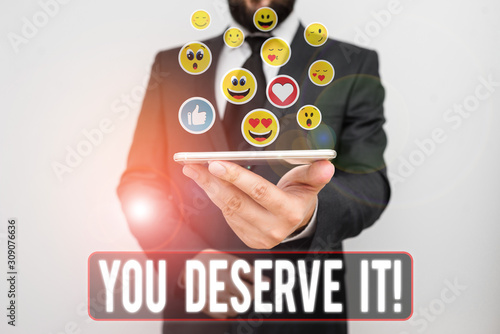 Writing note showing You Deserve It. Business concept for should have it because of their qualities or actions