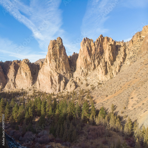Rocks in a beautifully large canyon, desert with river. Smith Rock State Park National Park. Oregon State. Top view. Square photo. © Anton