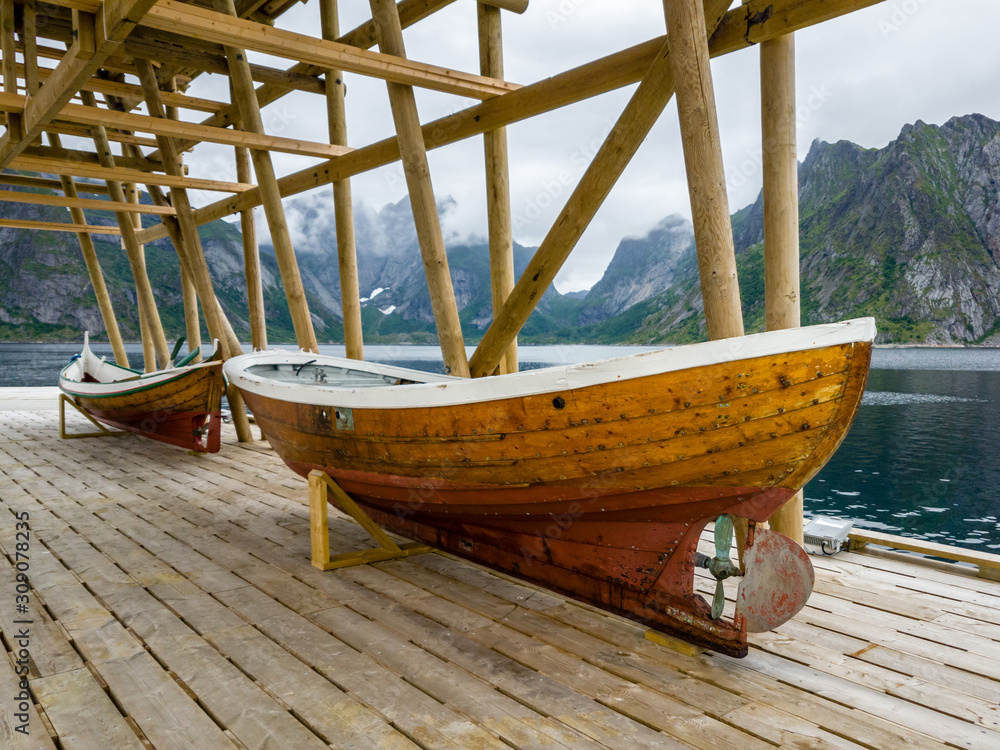 Fototapeta premium Shed with two boats in the fishing villages Sakrisoy of the Lofoten Islands