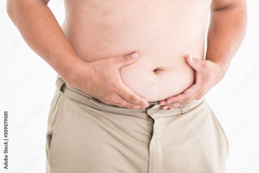 Naklejka premium Fat man checking out his weight isolated