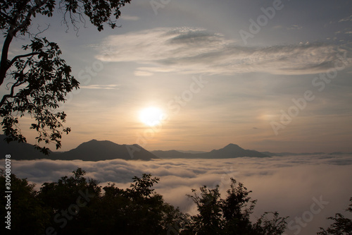 Mountain with white mist in morning sunrise  nature landscape