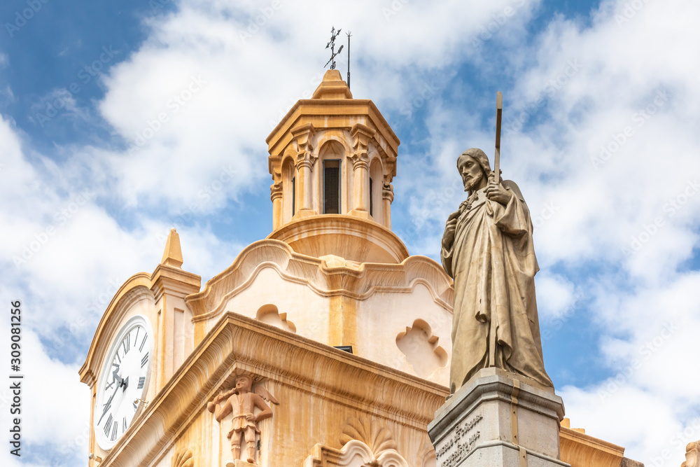 Cordoba Argentina cathedral clock tower and statue of Christ