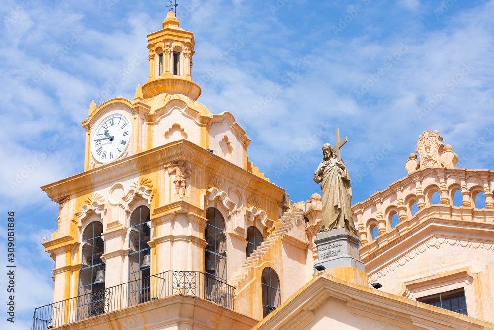 Cordoba Argentina cathedral clock tower and Jesus Christ statue