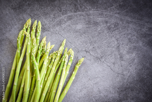 Fresh Asparagus on black background - Bunch green asparagus organic for cooking food
