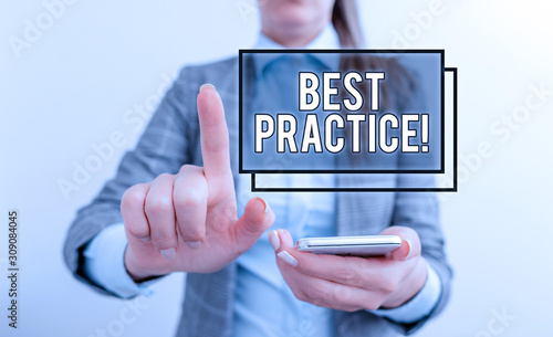 Text sign showing Best Practice. Business photo text commercial procedures accepted prescribed being correct Business concept with mobile phone and business woman