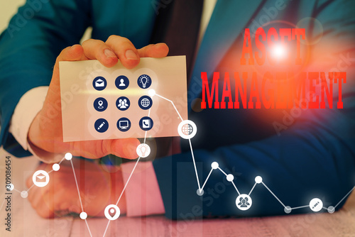 Conceptual hand writing showing Asset Management. Concept meaning analysisaged investment of assets of a demonstrating or business photo