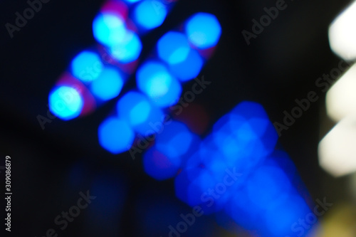 Blue heptagonal bokeh on a dark background. photo