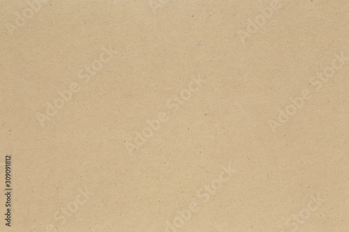 Brown paper texture background or cardboard surface from a paper box for packing.