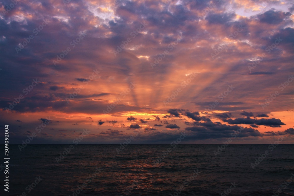 The first sunbeam of the morning at sea The first sunbeam of the morning at sea