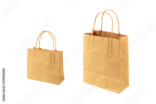 Recycled brown paper shopping bags isolated on white background with clipping path