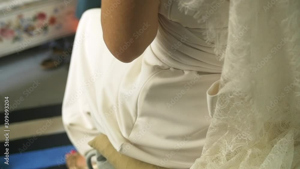Bride in her wedding dress before the ceremony Bride in her wedding dress before the ceremony