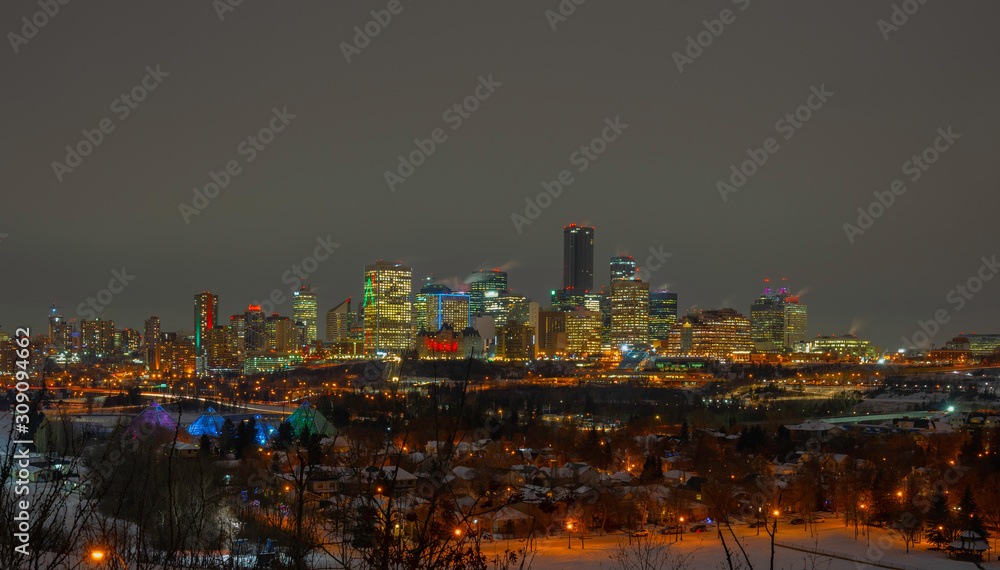 Fototapeta premium Beautiful panorama of downtown Edmonton, Alberta, Canada with Christmas Theme night lights.