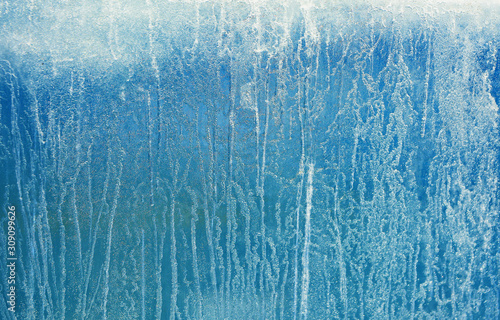 Ice background. The frozen texture of the water