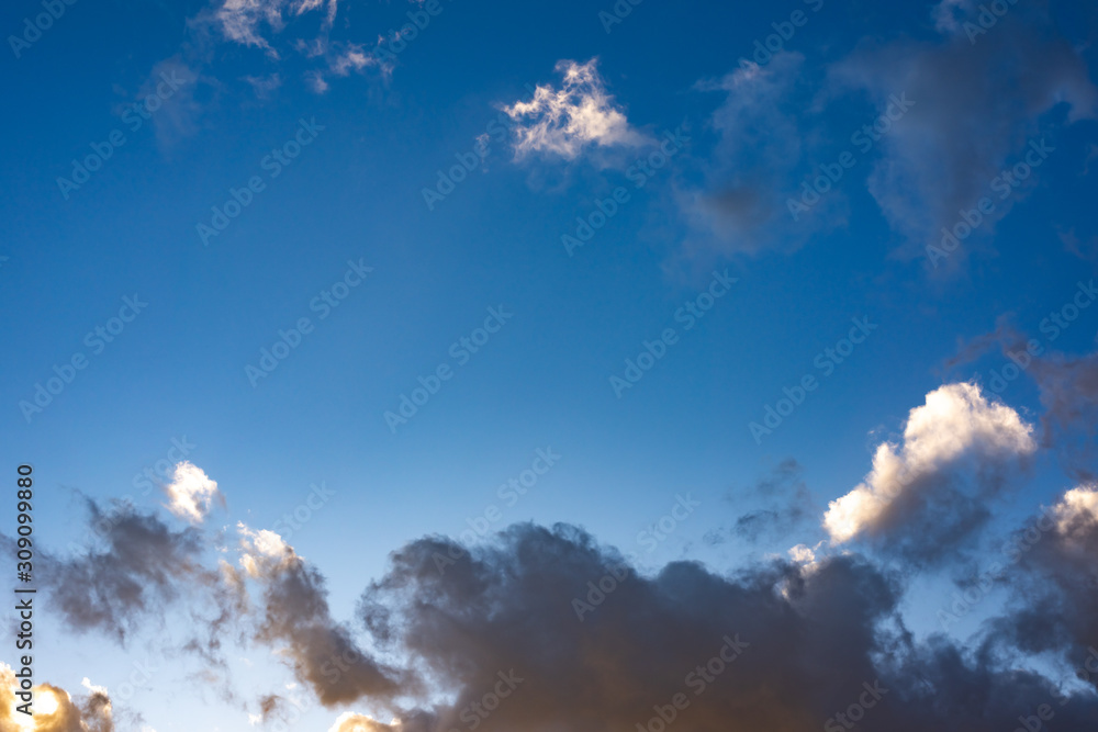 Evening sky with black clouds. Evening sky with white clouds. Evening sky with black clouds. Evening sky with white clouds.