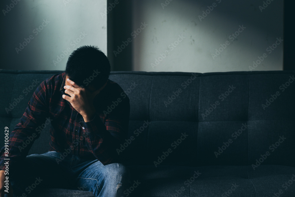 Fototapeta premium panic attacks alone young man sad fear stressful depressed emotion.crying begging help.stop abusing domestic violence,person with health anxiety,people bad frustrated exhausted feeling down