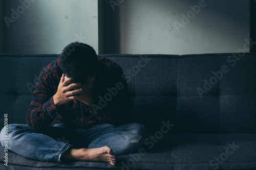 panic attacks alone young man sad fear stressful depressed emotion.crying begging help.stop abusing domestic violence,person with health anxiety,people bad frustrated exhausted feeling down © panitan