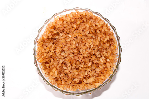 Close up Rice devzira Red with white background 