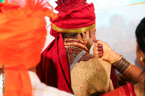 Indian wedding ceremony : groom and bridal hand  photo