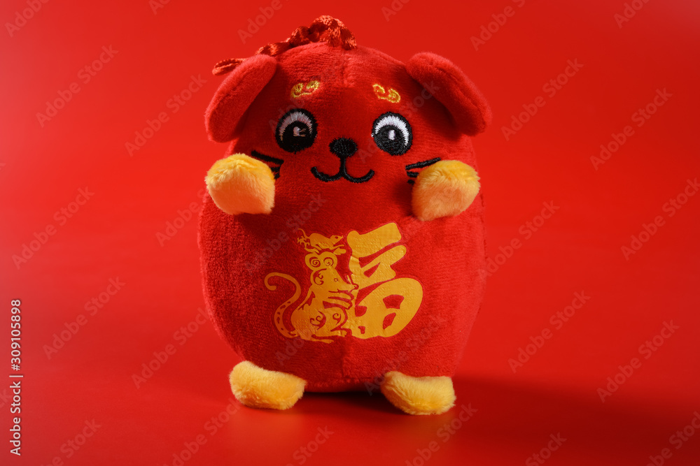 Naklejka premium rat mascot on red background the Chinese means fortune