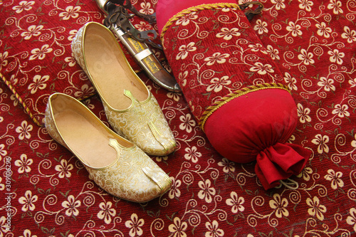 Traditional indian wedding ceremony : Grooms shoes photo