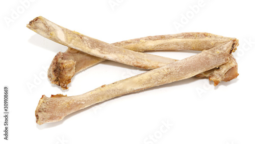 Animal ribs bones isolated on white background. leftover food closeup © Илья Подопригоров