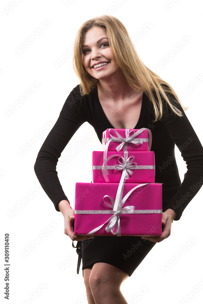 Girl holding stack of pink gift boxes Girl holding stack of pink gift boxes
