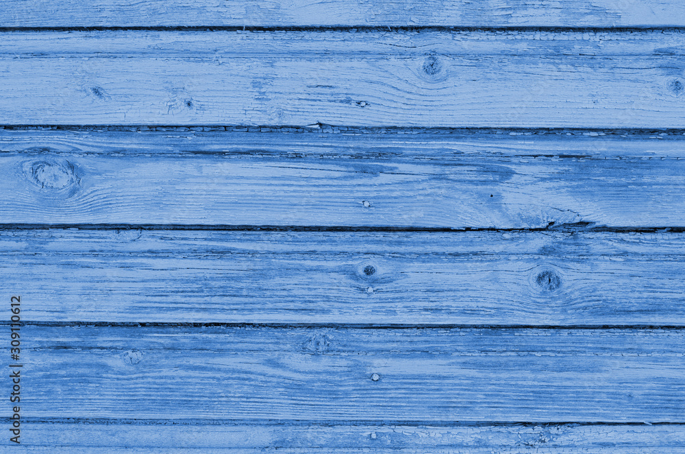 Obraz premium The blue wood texture with natural patterns. Classic Blue color. Color of the year 2020. Trendy color.