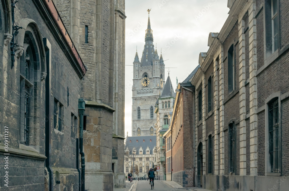 Obraz premium architecture, beautiful, belfry, belgium, brown, building, center, city, cityscape, contrasts, cyclist, day, europe, facade, ghent, gothic, gray, high, historic, historical, history, landmark, medieva