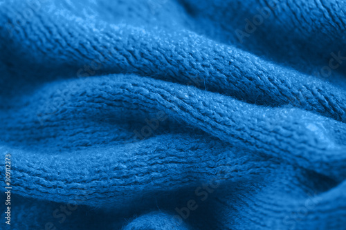 Soft velvet texture. Trendy blue color. The concept of femininity, home comfort, warmth